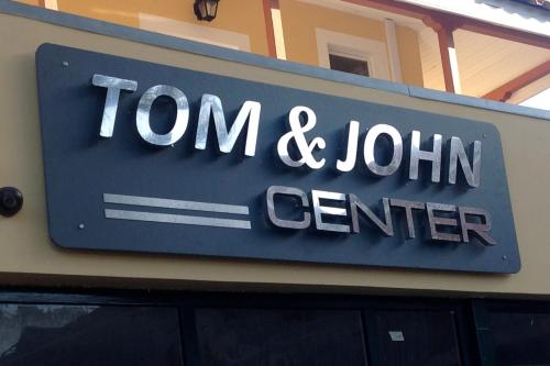 TOM & JOHN CENTER