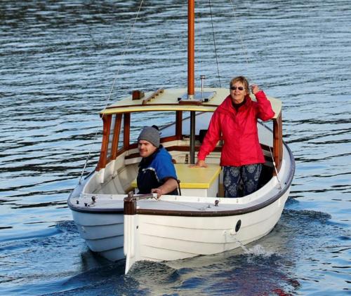 Raylene taking ownership of her new boat, Else, Hayden Johnson at tiller