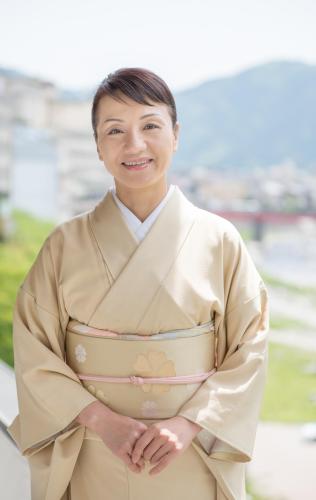 女将